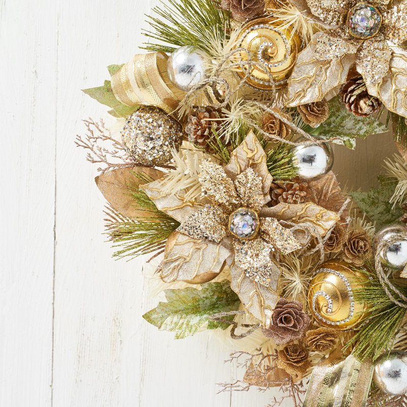 24" Artificial Christmas Wreath displayed on a front door
