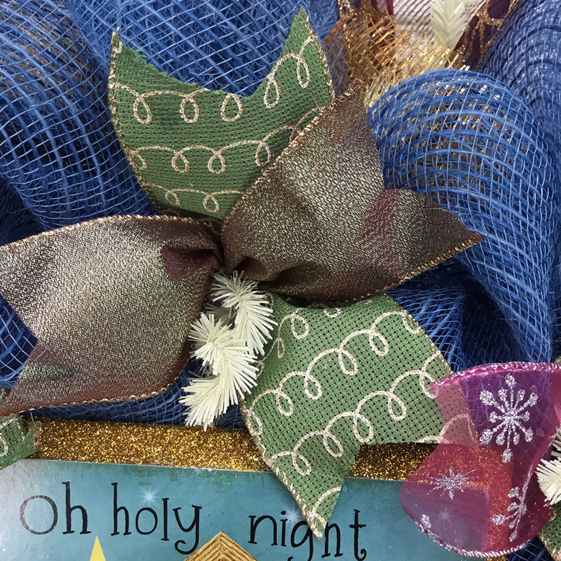 11" Flocked Christmas Wreath hanging on a front door