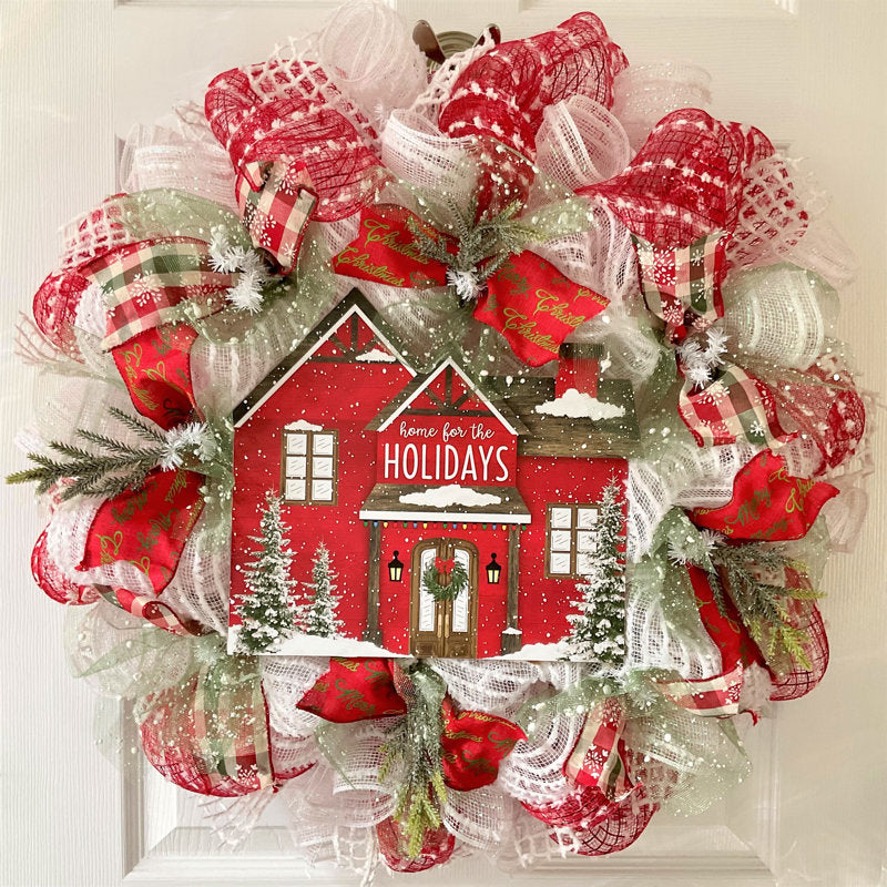 Pre-Lit Sparkle Artificial Spruce Christmas Wreath hung on a wooden door