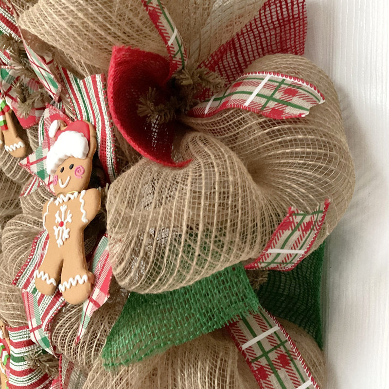 22" Farmhouse Artificial Cedar Christmas Wreath displayed on a front door