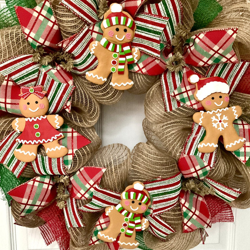 22" Farmhouse Artificial Cedar Christmas Wreath displayed on a front door