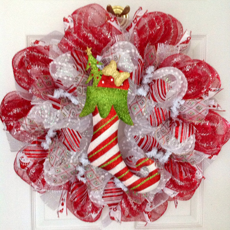 Elf Christmas Wreath hung on a wooden door