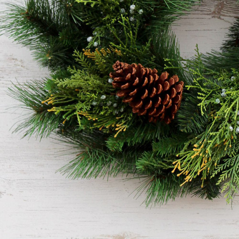 26" Artificial Christmas Wreath as a festive door display