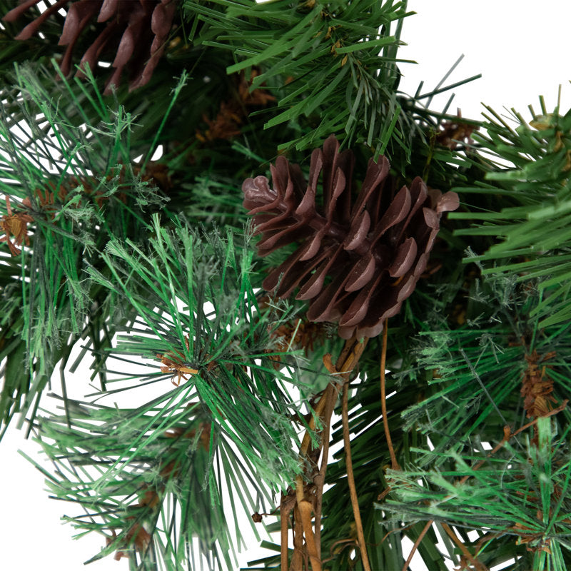 26" Artificial Pine Christmas Wreath hung on a wooden door