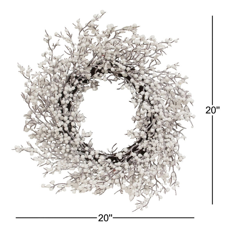 24" Pre-Lit Flocked Artificial Ornament Christmas Wreath hanging on a front door