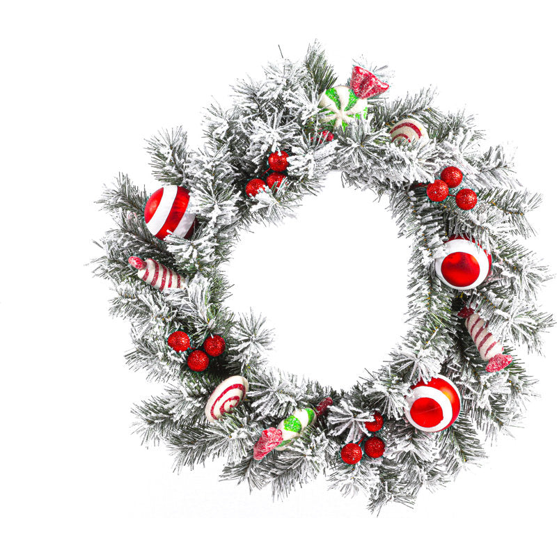 24" Artificial Christmas Wreath as a festive door display