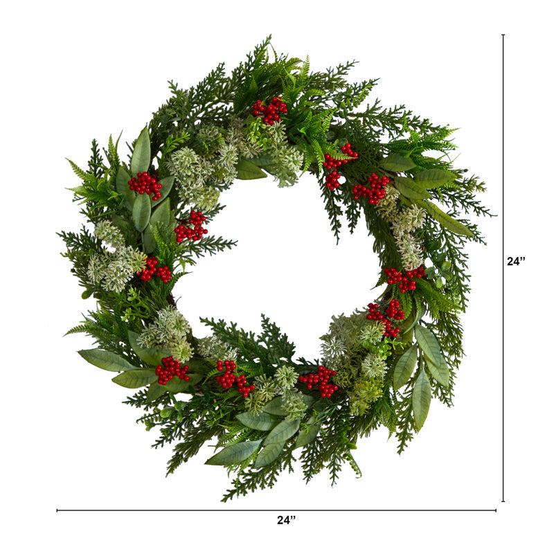 24" Pre-Lit Frosted Pine Christmas Wreath hung on a wooden door