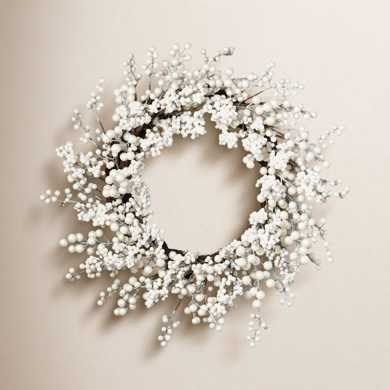 24" Artificial Christmas Wreath as a festive door display