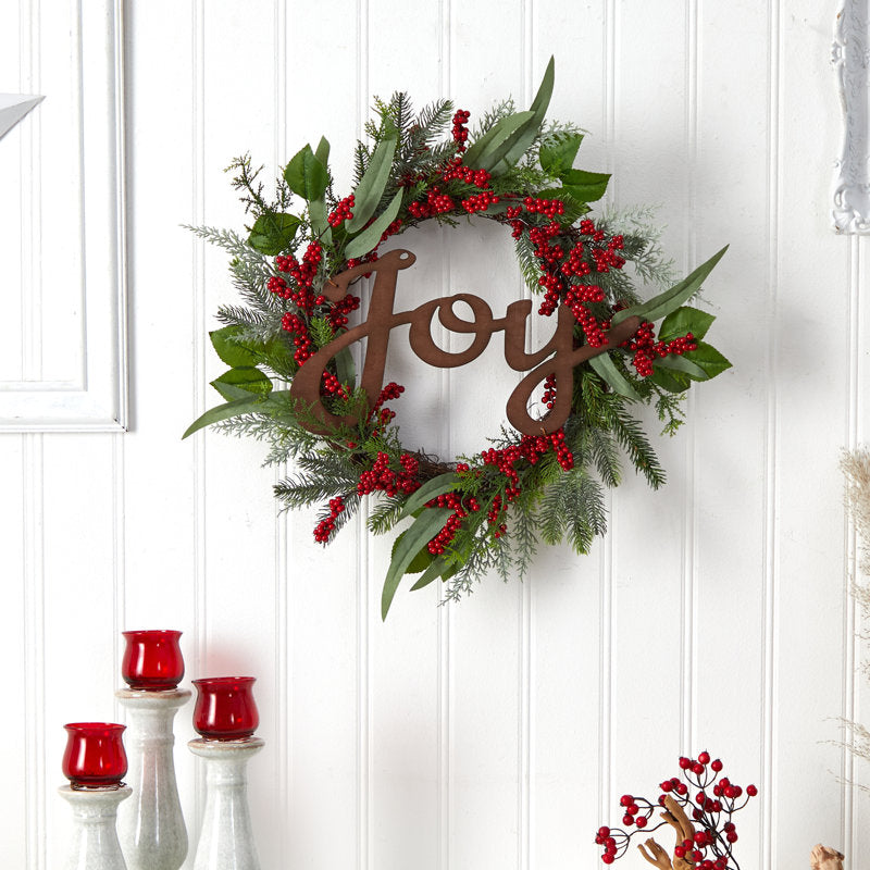 Artificial Christmas Wreath displayed on a front door