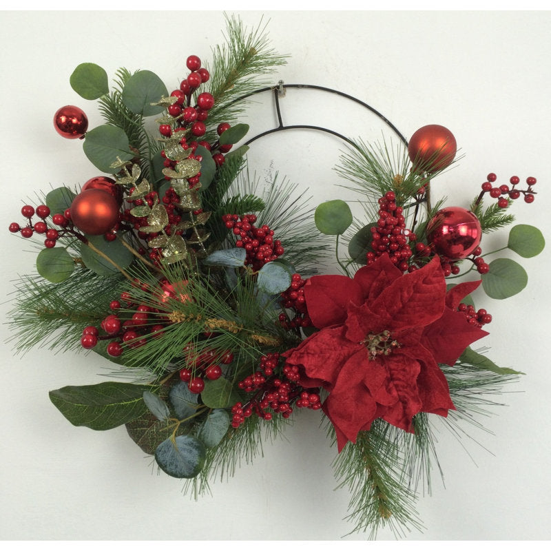 24" Artificial Christmas Wreath as a festive door display