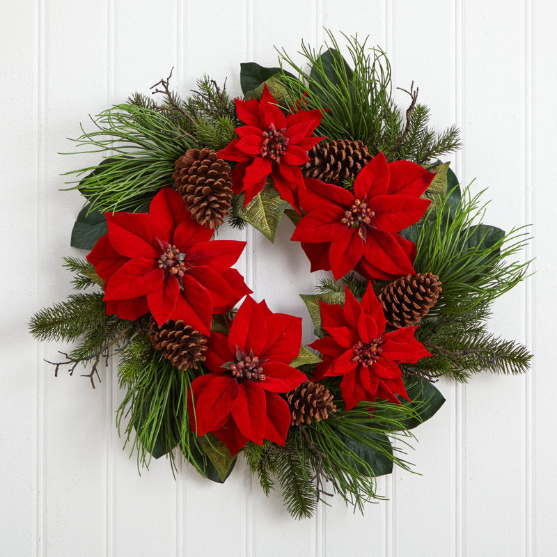 Flocked Artificial Pine Christmas Wreath hung on a wooden door