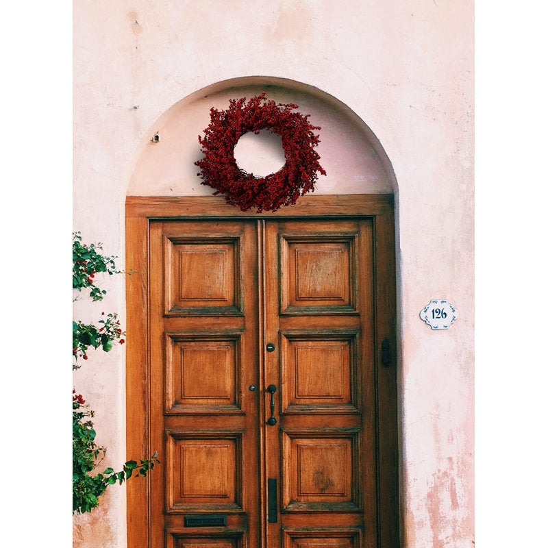 24" Pre-Lit Fir Christmas Wreath on an outdoor entryway