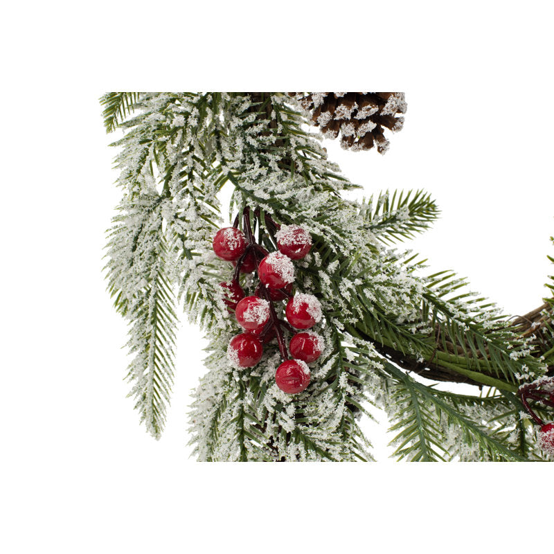 Christmas Wreath hung on a wooden door