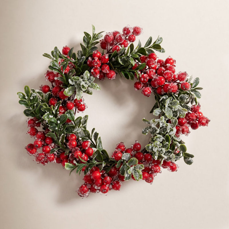 Artificial Pine Christmas Wreath displayed on a front door