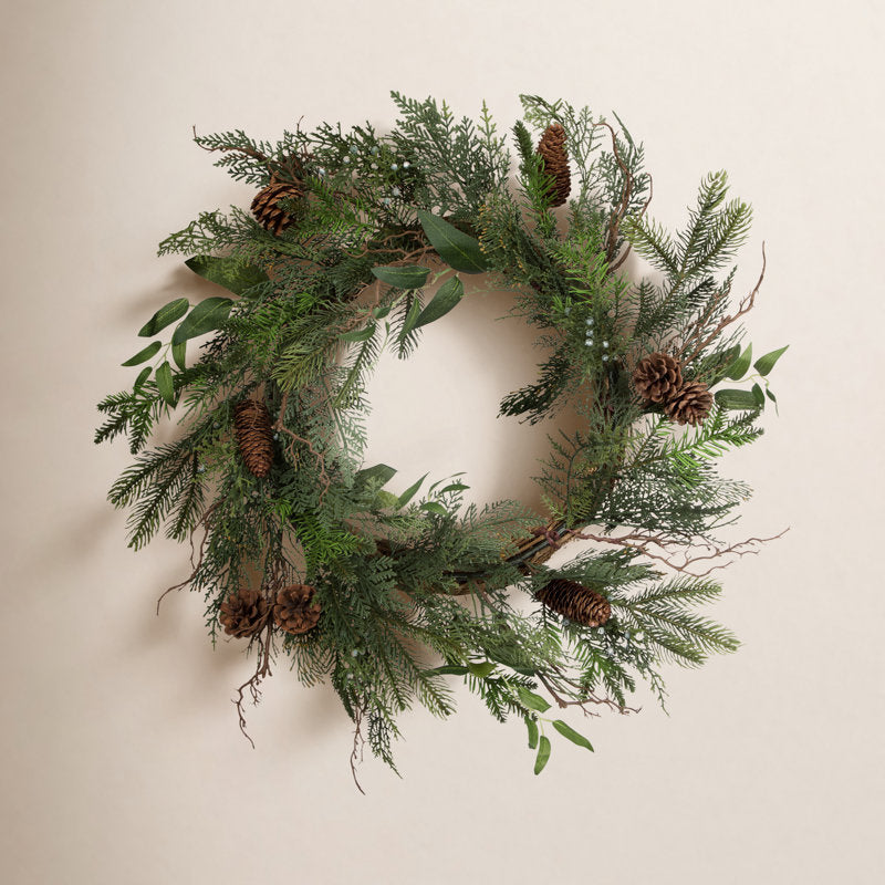 24" Pre-Lit Christmas Wreath displayed on a front door