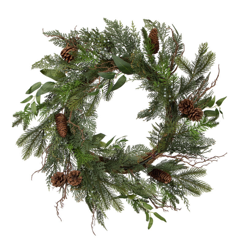 24" Artificial Cedar Christmas Wreath hung on a wooden door