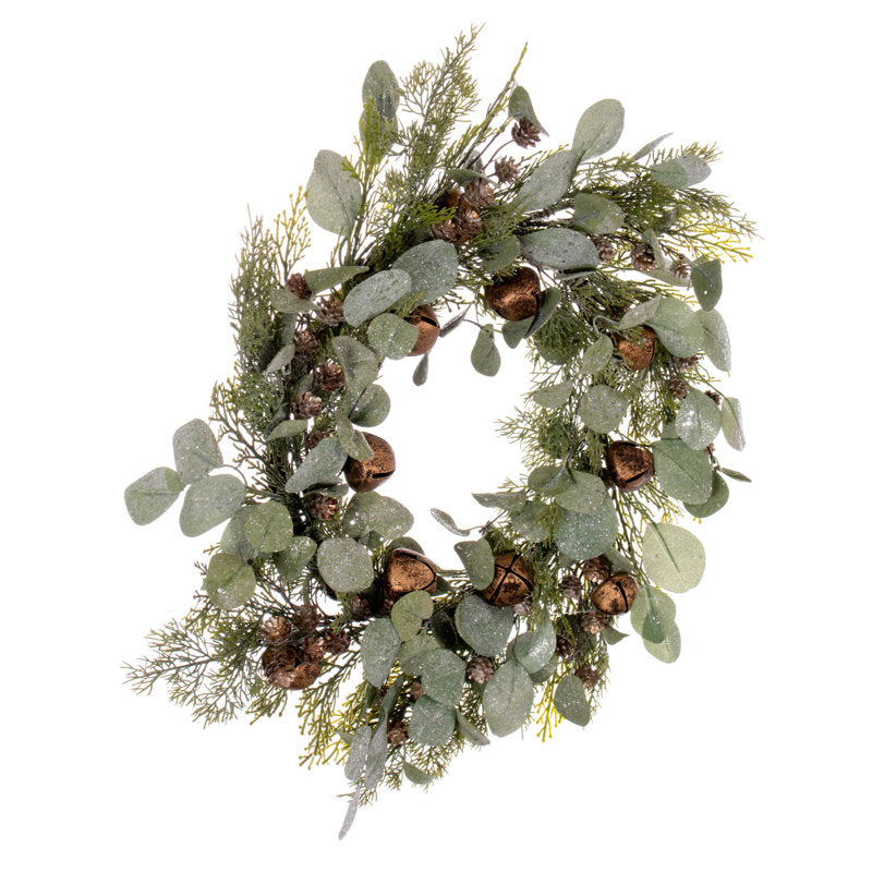 22" Artificial Cedar Christmas Wreath hanging on a front door