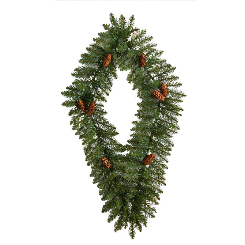 24" Pine Christmas Wreath hanging on a front door