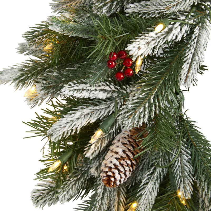 24" Farmhouse Artificial Cedar Christmas Wreath hung on a wooden door