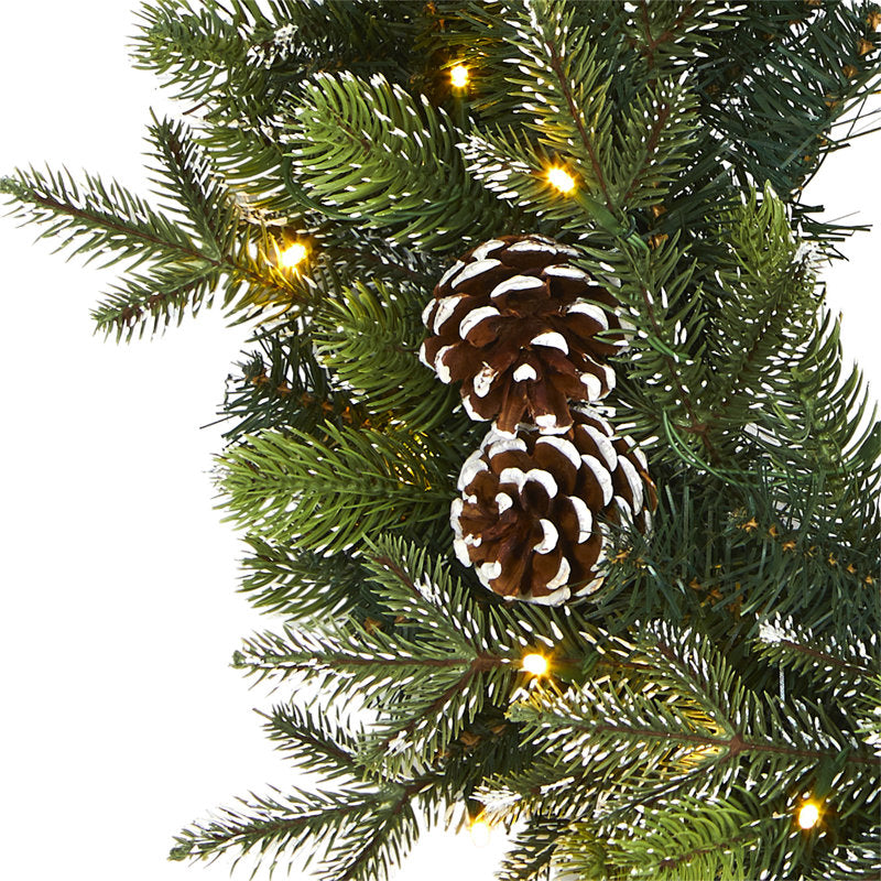 26" Artificial Fir Christmas Wreath hung on a wooden door