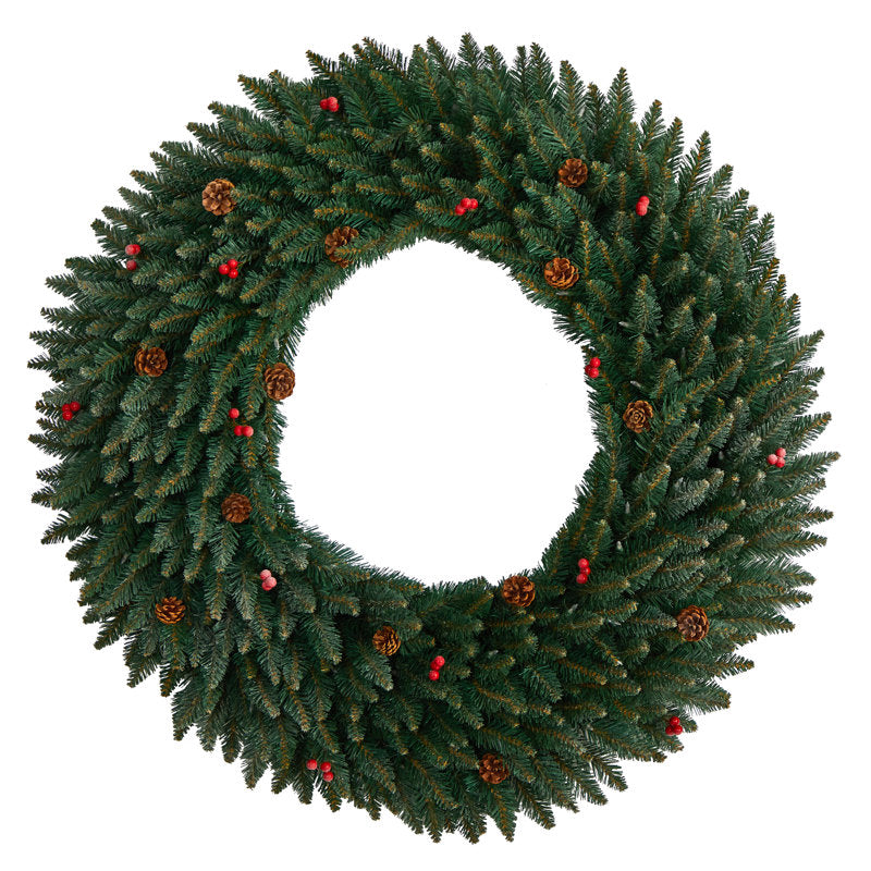 12" Artificial Christmas Wreath displayed on a front door