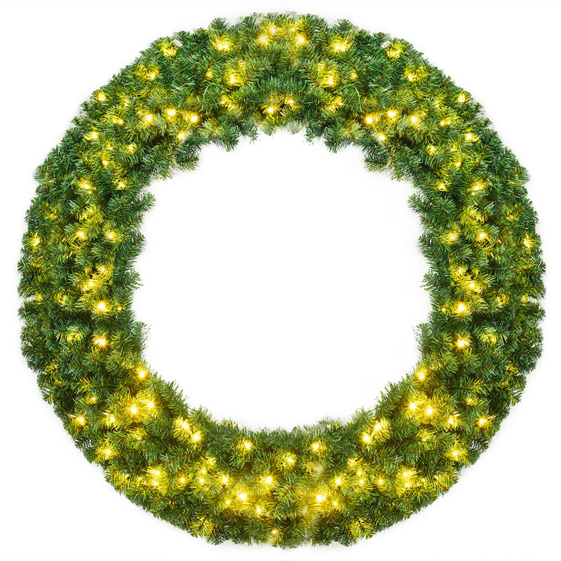 Pre-Lit Frosted Pine Christmas Wreath hung on a wooden door