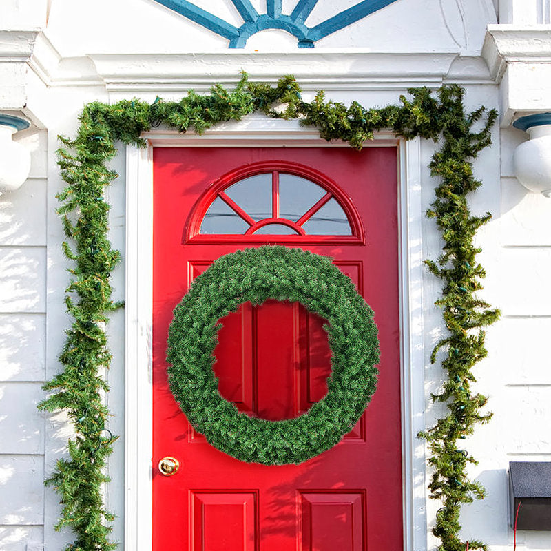 Pre-Lit Frosted Pine Christmas Wreath hung on a wooden door