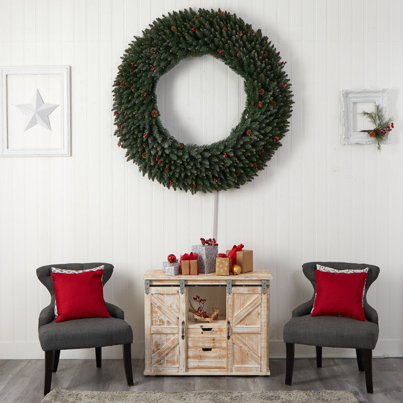 18" Artificial Christmas Wreath hung on a wooden door