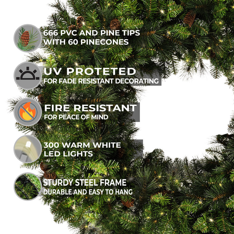 24" Artificial Pine Christmas Wreath displayed on a front door