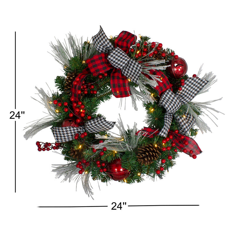 22" Pre-Lit Artificial Ornament Christmas Wreath hanging on a front door