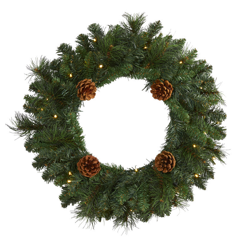 20" Pre-Lit Artificial Pine Christmas Wreath hung on a wooden door