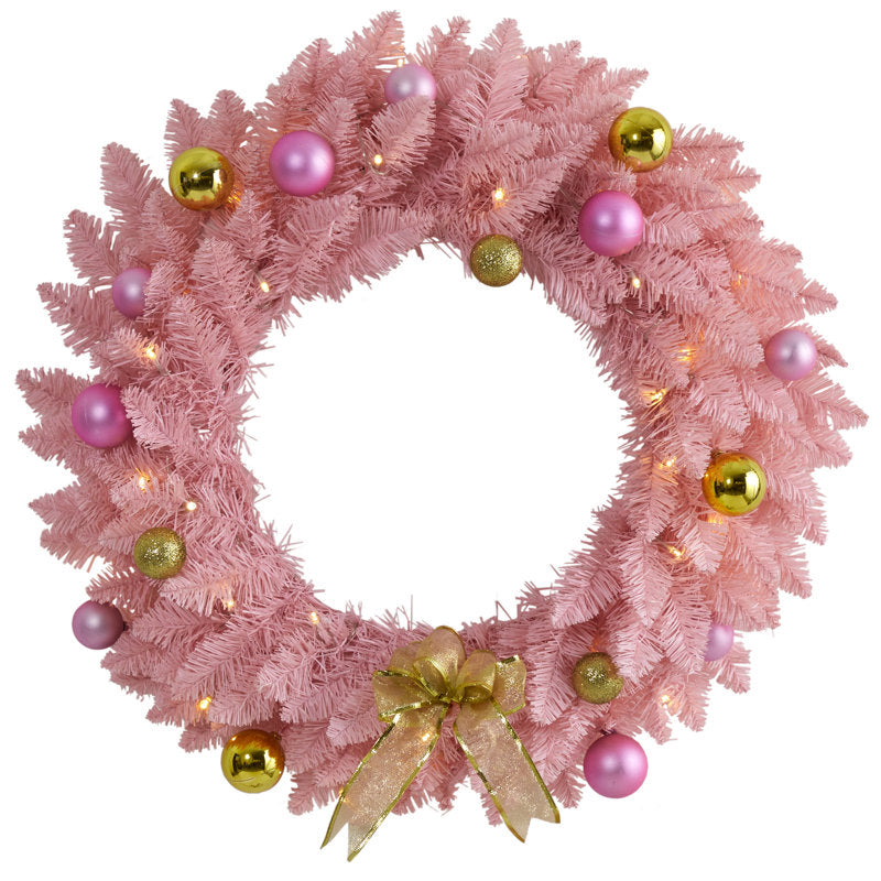 24" Pre-Lit Artificial Pine Christmas Wreath hung on a wooden door