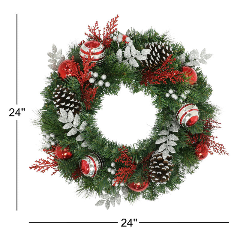 26" Artificial Pine Christmas Wreath hung on a wooden door