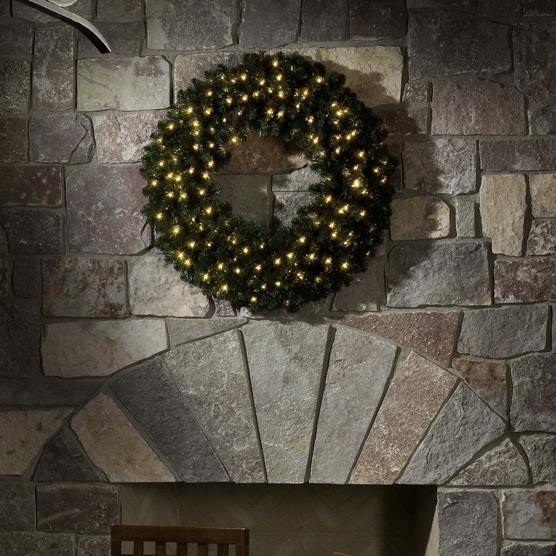 32" Artificial Christmas Wreath displayed on a front door