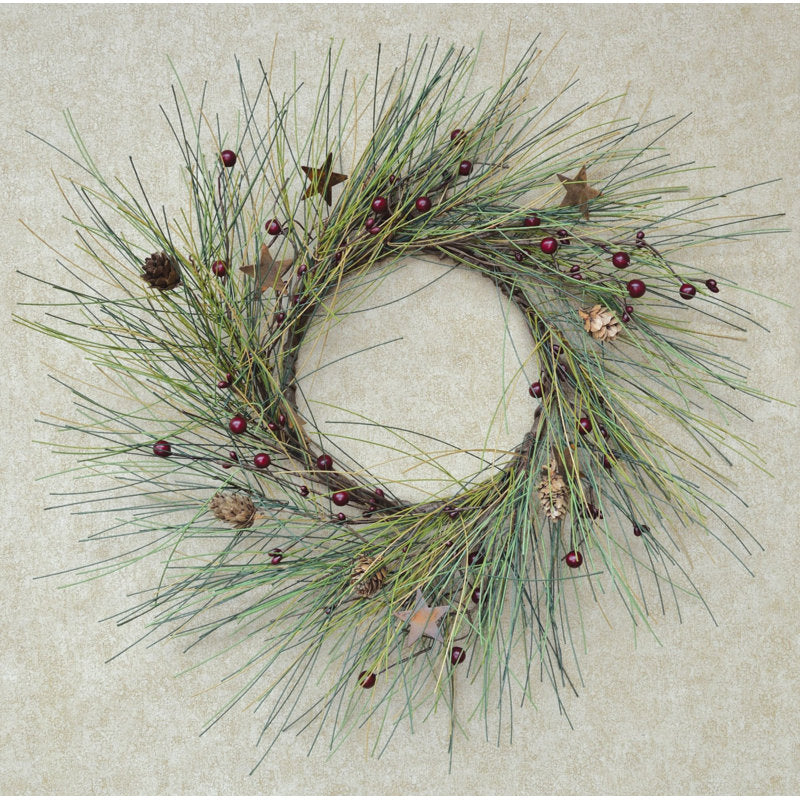 15" Artificial Pine Christmas Wreath hanging on a front door