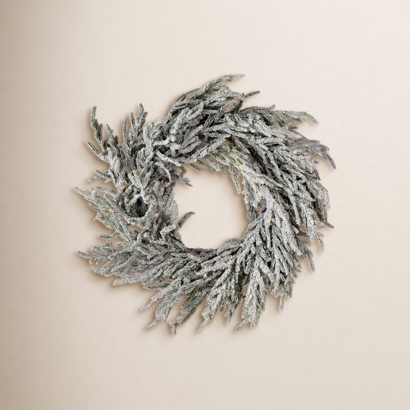 23.62" Artificial Pine Christmas Wreath as a festive door display
