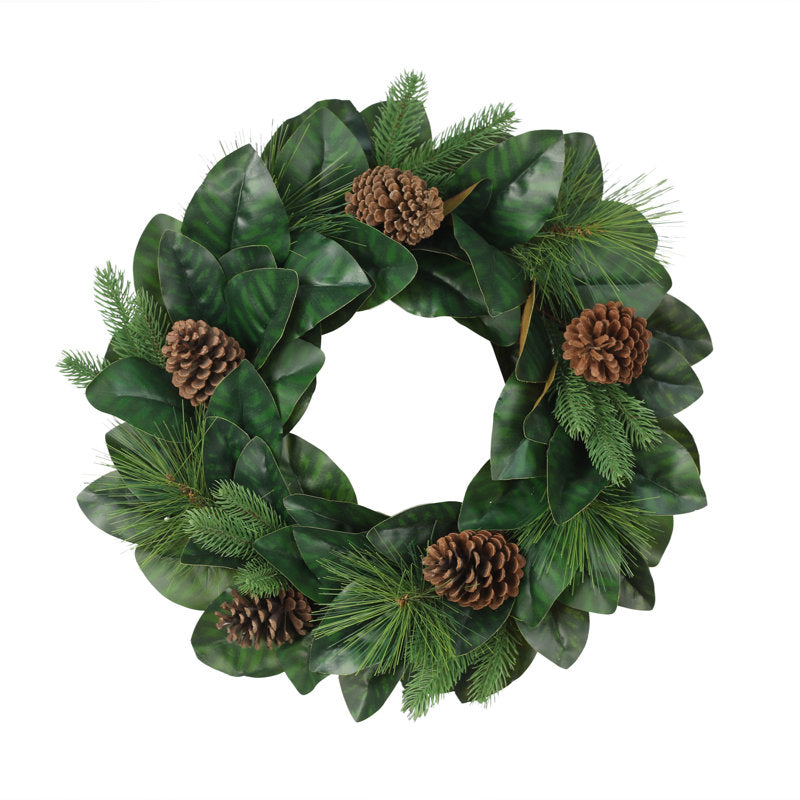 24" Artificial Pine Christmas Wreath hanging on a front door