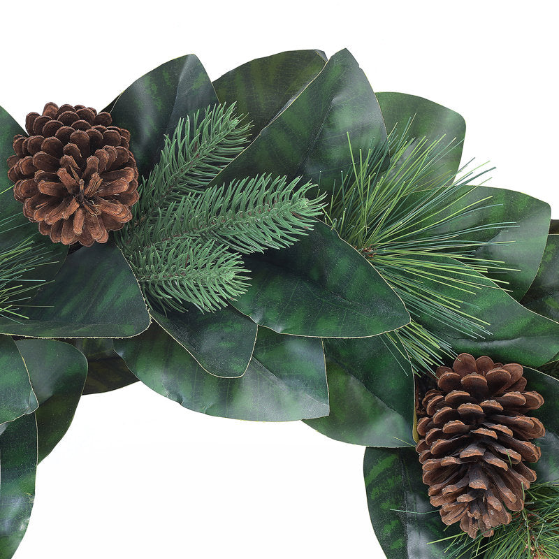 Christmas Wreath hung on a wooden door