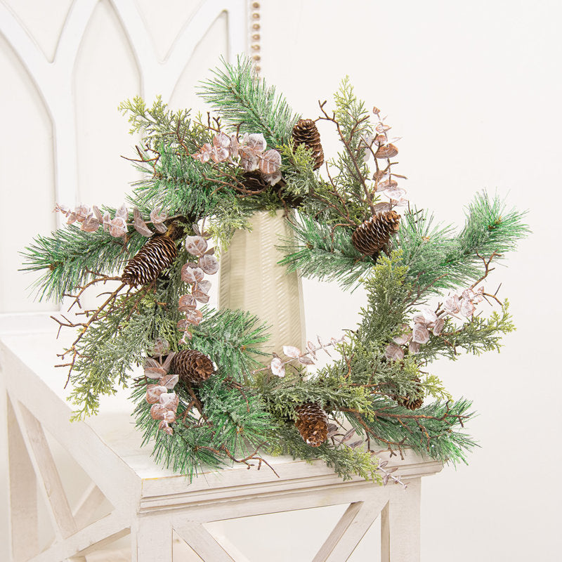 Artificial Berry Christmas Wreath hung on a wooden door