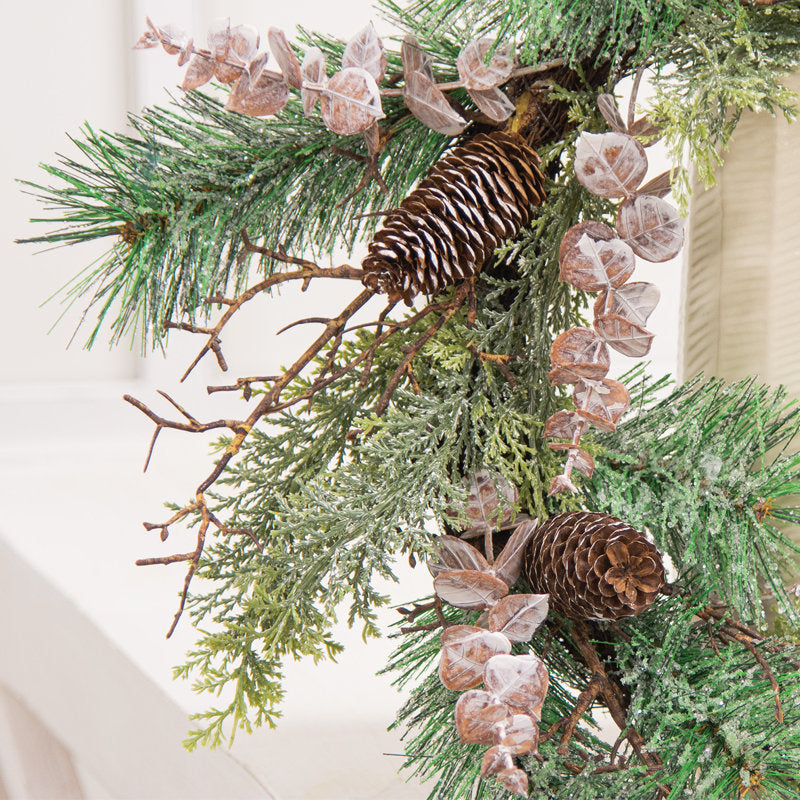Artificial Berry Christmas Wreath hung on a wooden door