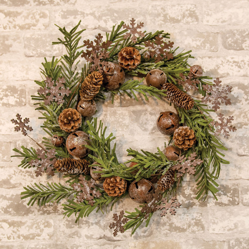 26" Flocked Pine Christmas Wreath displayed on a front door