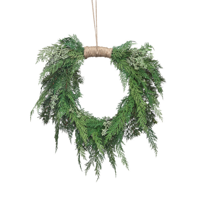 Artificial Pine Christmas Wreath hanging on a front door