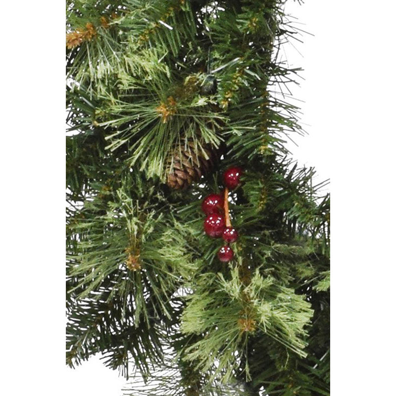 Artificial Pine Christmas Wreath displayed on a front door