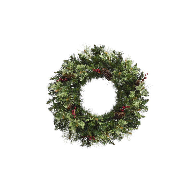 24" Artificial Pine Christmas Wreath hanging on a front door