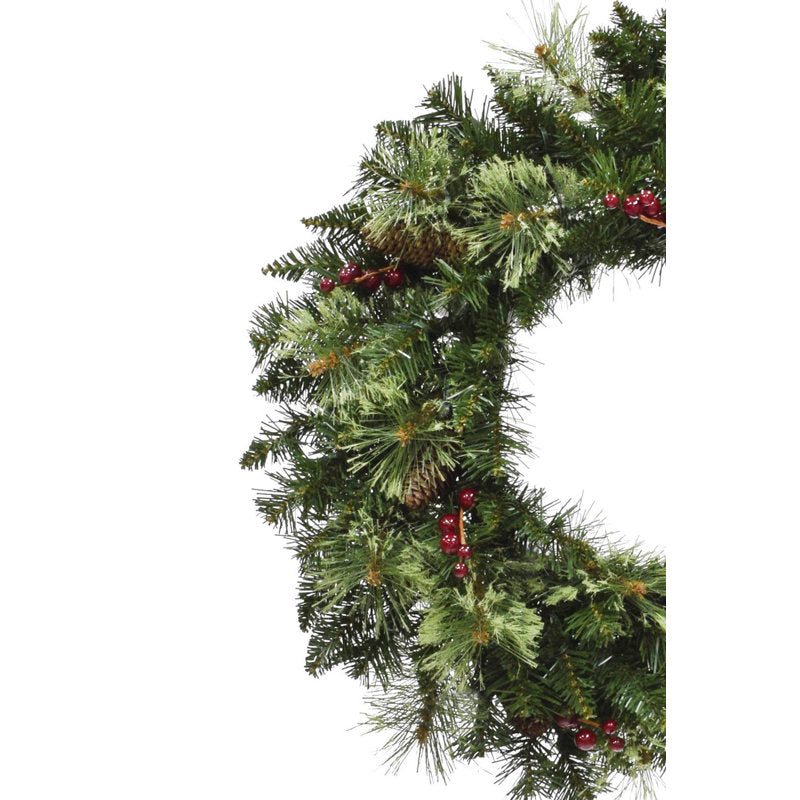 Artificial Pine Christmas Wreath displayed on a front door