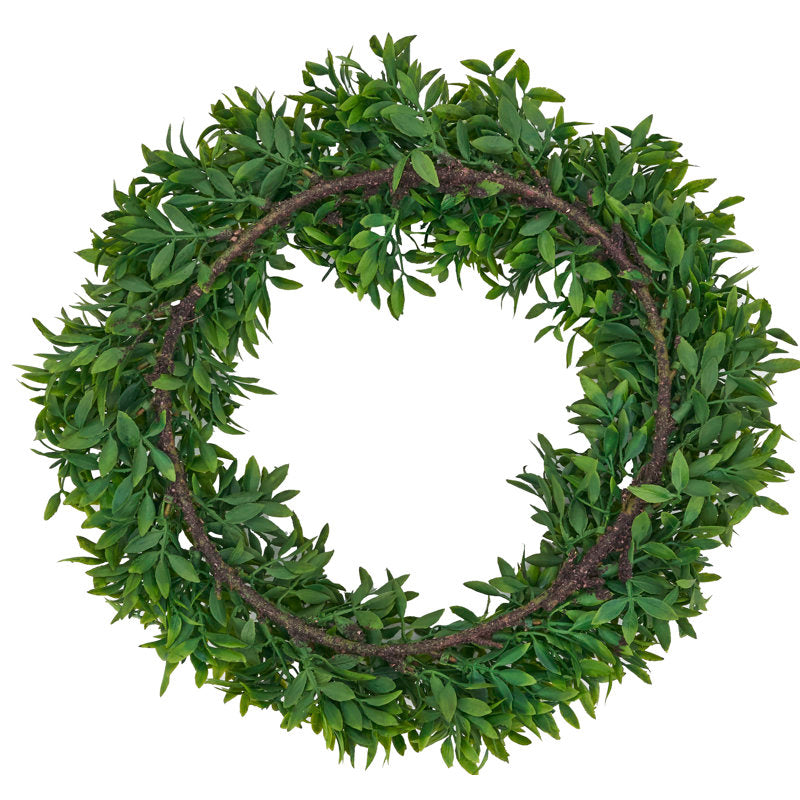 12" Artificial Christmas Wreath displayed on a front door