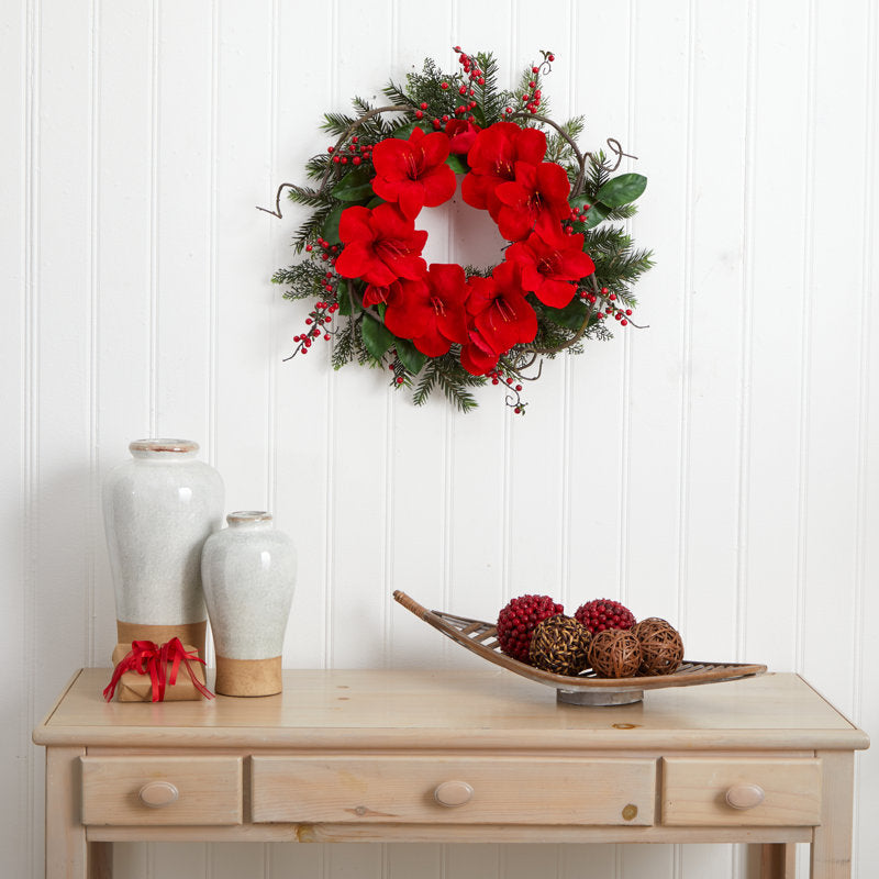 24" Artificial Christmas Wreath hung on a wooden door