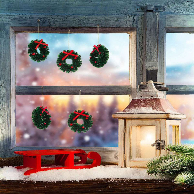 30" Pre-Lit Artificial Christmas Wreath hung on a wooden door