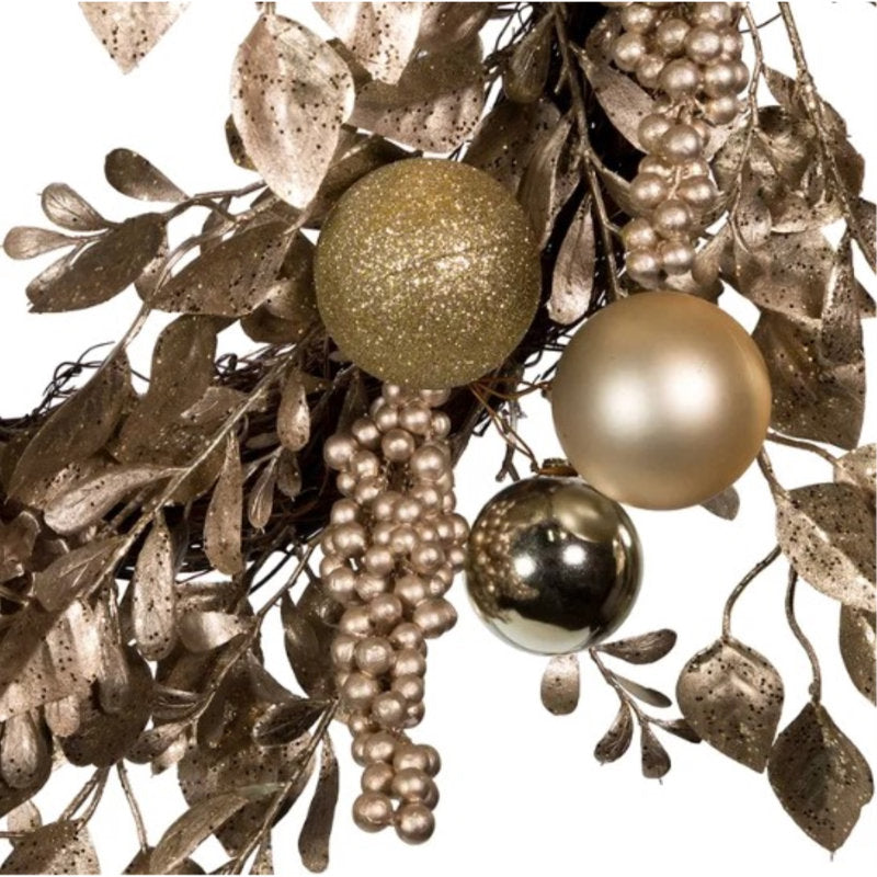 20" Pre-Lit Artificial Pine Christmas Wreath hung on a wooden door