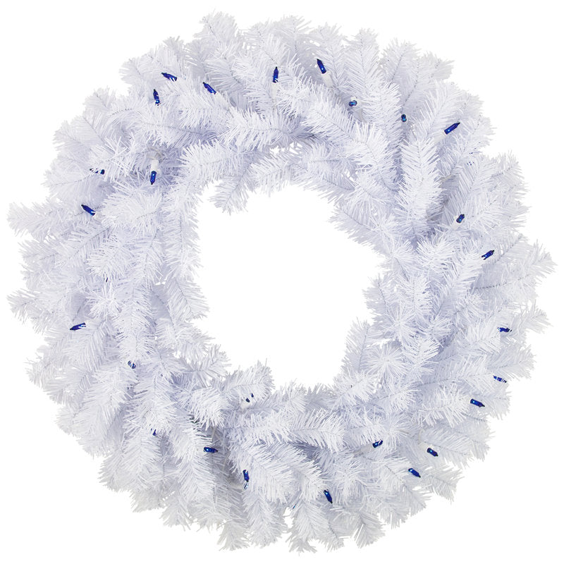 4" Artificial Spruce Christmas Wreath displayed on a front door